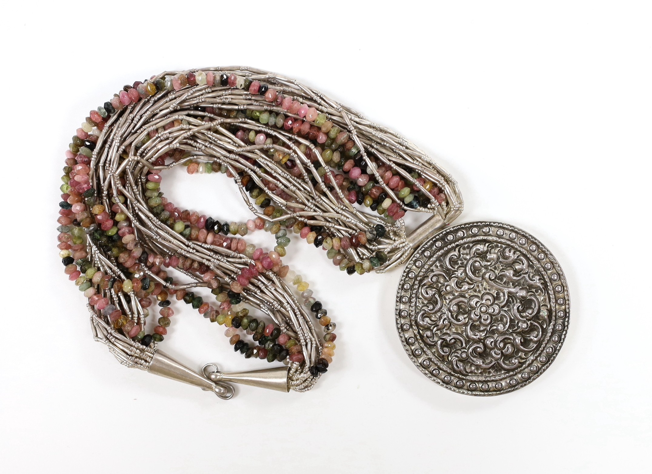 Kai-Yin-Lo of Hong Kong- a white metal and multi strand gem bead set pendant necklace, approx. 55cm.